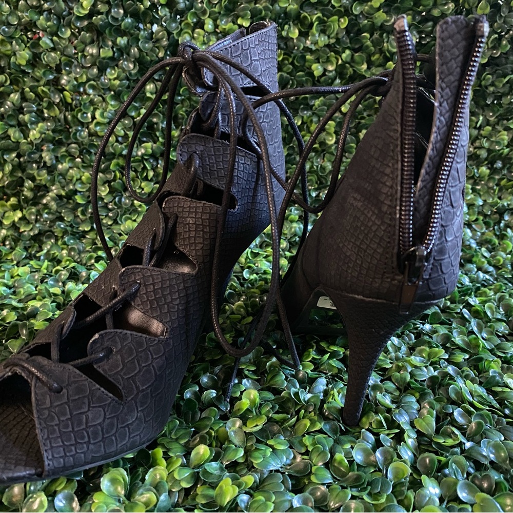 One worn lace up heels